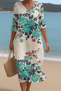 Maud |  Long white dress with turquoise flowers